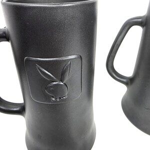 VTG 70's PLAYBOY CLUB Mugs w/BUNNY LOGO Black Matt Glass Beer Stein - Set of 2